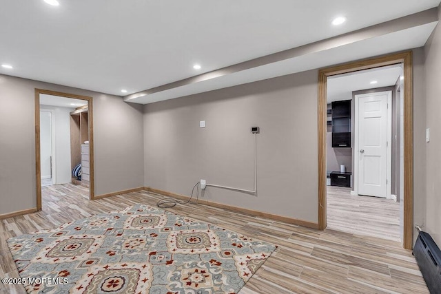136 Van Brackle Rd, Matawan, NJ 07747 - empty room featuring baseboard heating, baseboards, light wood-style floors, and recessed lighting