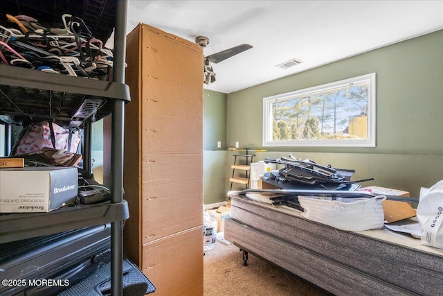 bedroom with visible vents and carpet flooring