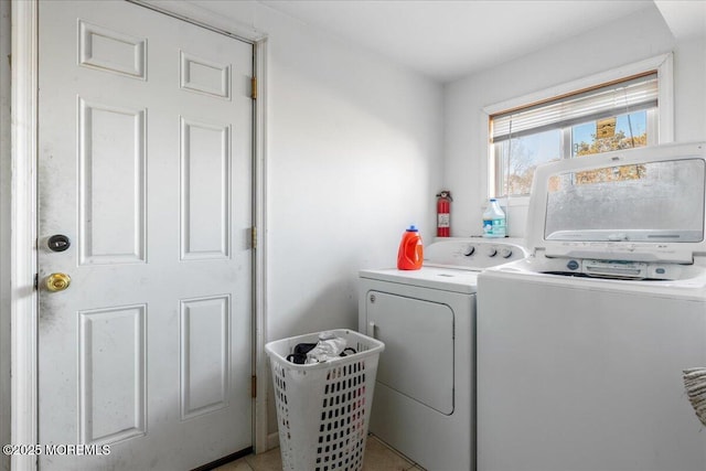 laundry area with laundry area and washing machine and dryer