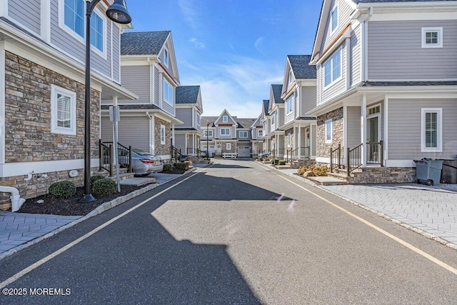 view of road with a residential view