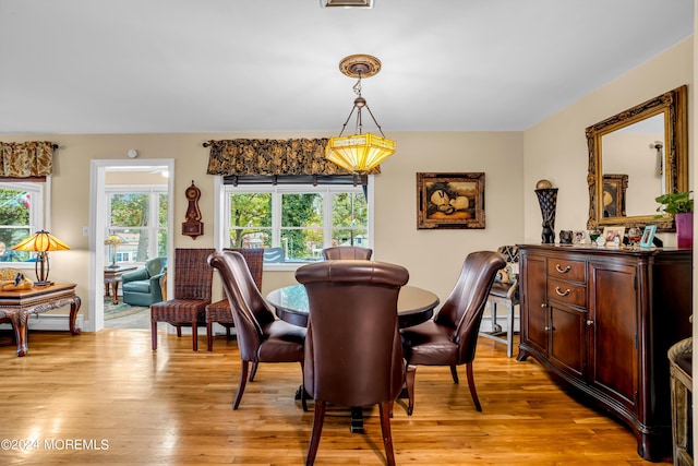 dining room featuring light wood-style flooring