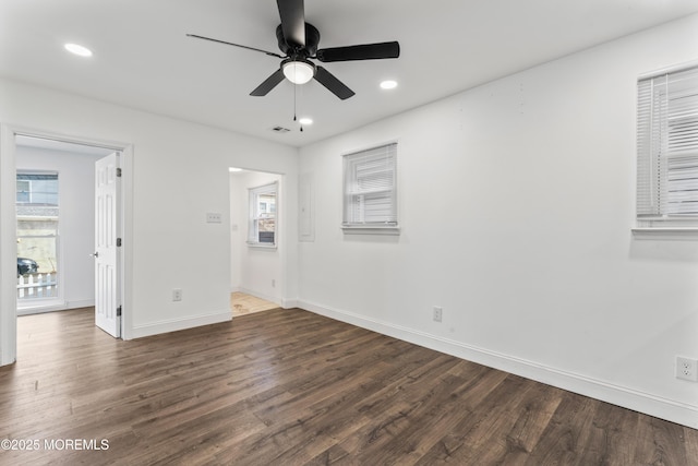 empty room featuring recessed lighting, wood finished floors, a ceiling fan, visible vents, and baseboards