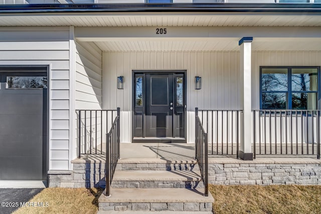 entrance to property with covered porch