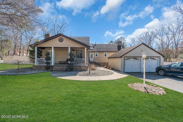 view of front of home with an outdoor structure, a front lawn, covered porch, and a chimney