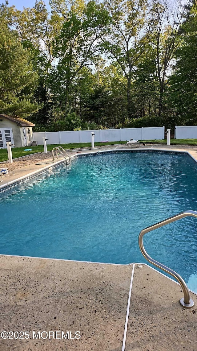 view of pool with a fenced in pool and a fenced backyard