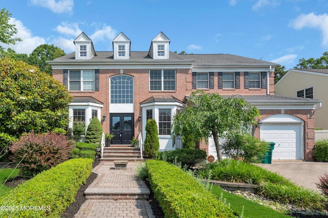 7 Trumbull Ct, Jackson, NJ 08527 - colonial inspired home with french doors, brick siding, driveway, and an attached garage