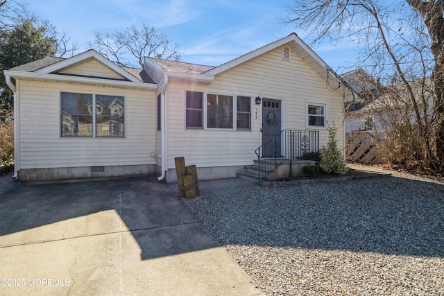 view of front of house with roof with shingles