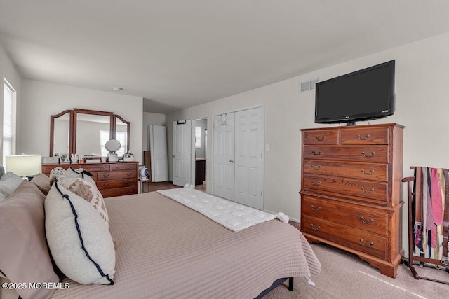 bedroom featuring carpet and visible vents