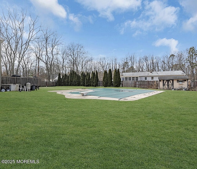 exterior space with fence, shuffleboard, and a yard