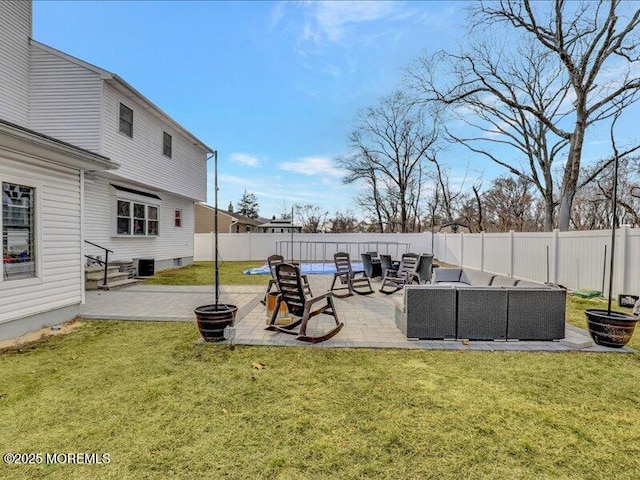 view of yard featuring a fenced backyard, an outdoor hangout area, and a patio