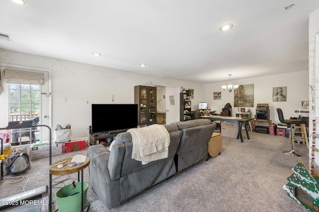 living area featuring an inviting chandelier, carpet, visible vents, and recessed lighting