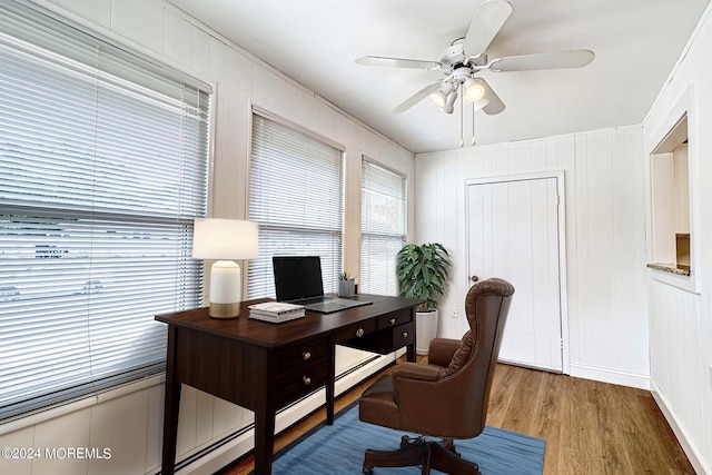 home office featuring ceiling fan and wood finished floors