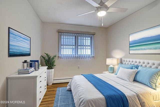 bedroom featuring dark wood-style floors, a baseboard radiator, and ceiling fan