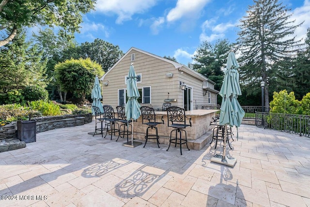 view of patio / terrace with outdoor dry bar