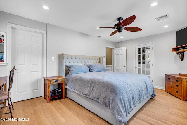 bedroom featuring light wood-style flooring, visible vents, a ceiling fan, and recessed lighting