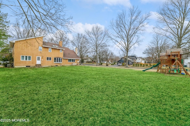 view of yard with a playground