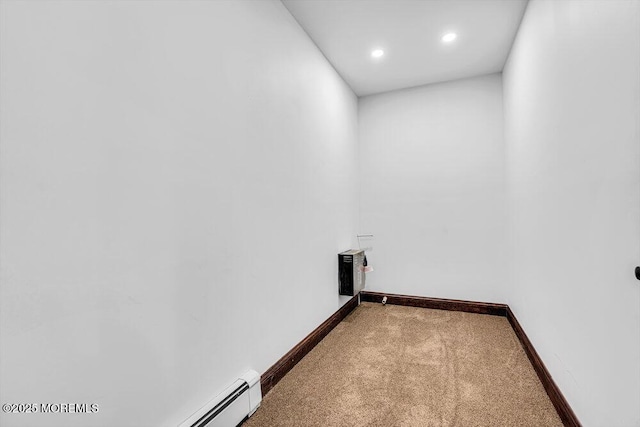 laundry area featuring carpet floors, baseboards, and recessed lighting