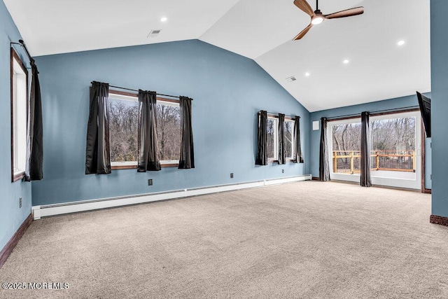 carpeted spare room featuring visible vents, baseboards, lofted ceiling, ceiling fan, and a baseboard heating unit