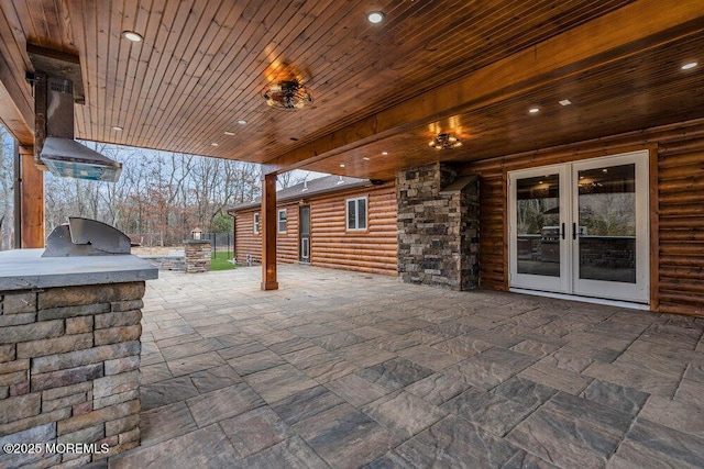 view of patio featuring exterior kitchen and french doors