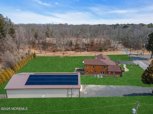 aerial view featuring a view of trees