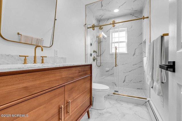 bathroom with a marble finish shower, toilet, marble finish floor, baseboard heating, and vanity