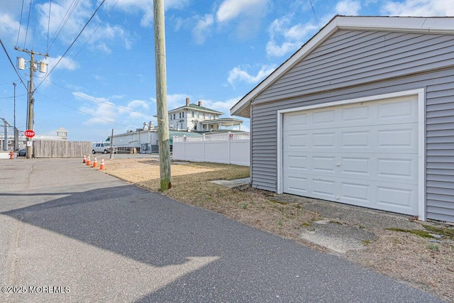 garage with fence