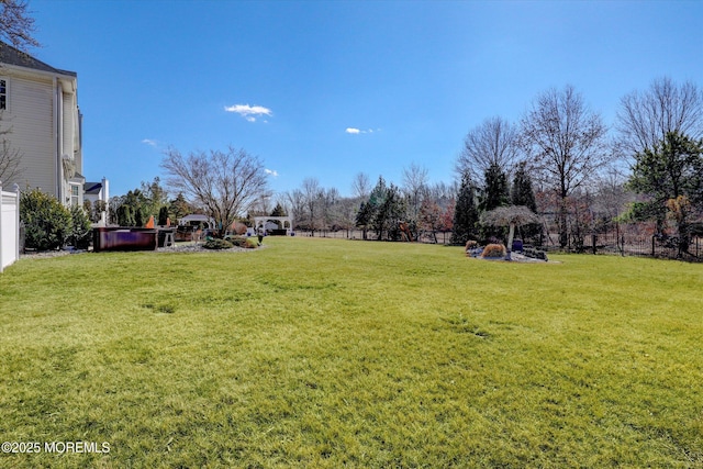 view of yard featuring fence