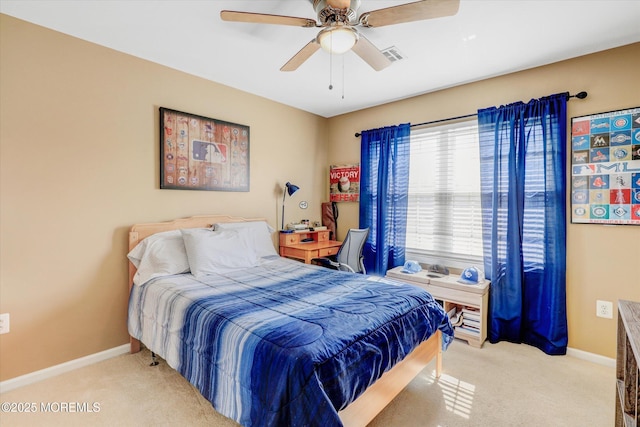 bedroom featuring a ceiling fan, light colored carpet, visible vents, and baseboards