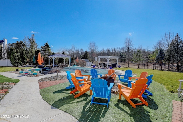 view of jungle gym featuring a gazebo, an outdoor fire pit, fence, and a pergola