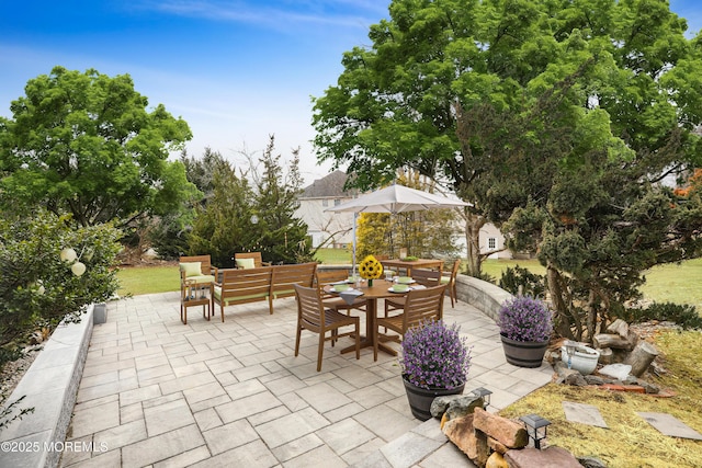 view of patio featuring an outdoor living space and outdoor dining area