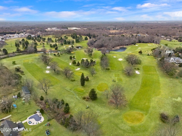 birds eye view of property with view of golf course