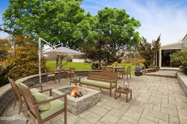 view of patio featuring a fire pit