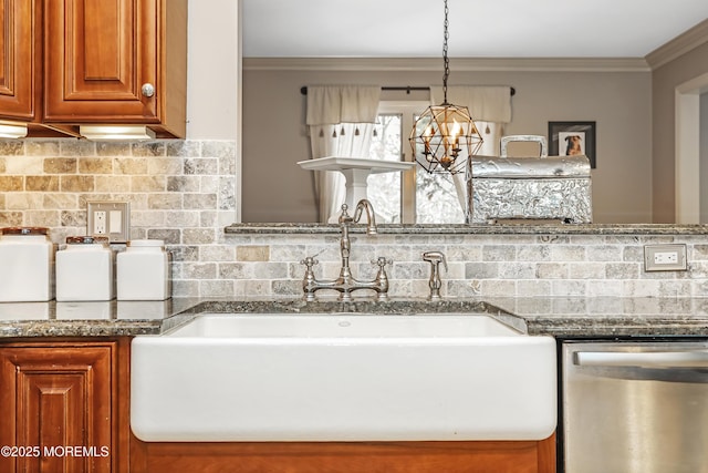 kitchen with brown cabinetry, a sink, stainless steel dishwasher, crown molding, and backsplash