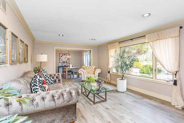 living room featuring recessed lighting, light wood-style flooring, baseboards, and ornamental molding