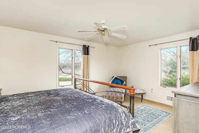 bedroom with a ceiling fan, carpet, and visible vents