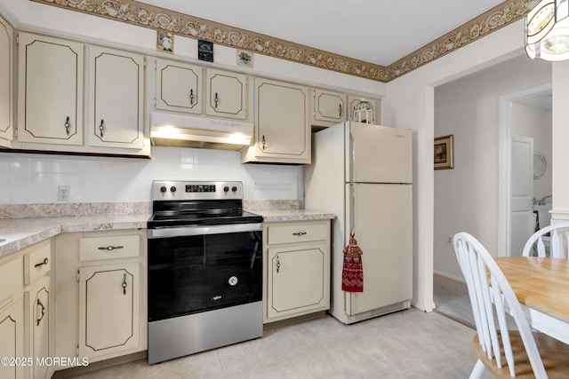 kitchen with light countertops, electric range, freestanding refrigerator, and under cabinet range hood