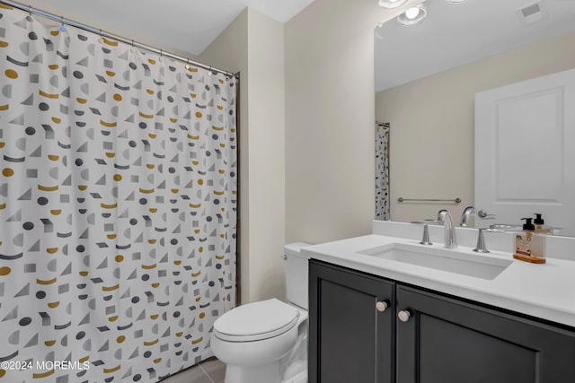 bathroom featuring visible vents, a shower with shower curtain, toilet, tile patterned floors, and vanity