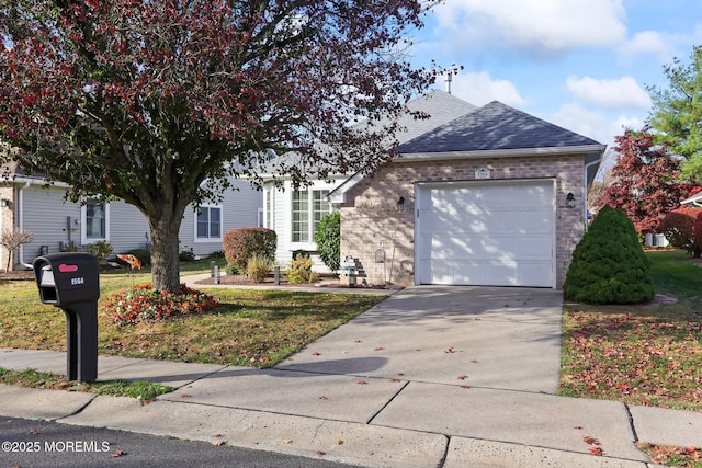 view of property hidden behind natural elements with a garage, driveway, a shingled roof, and brick siding