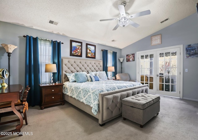 bedroom featuring french doors, light colored carpet, visible vents, vaulted ceiling, and access to outside