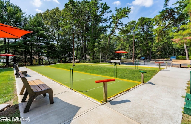 view of home's community featuring a lawn