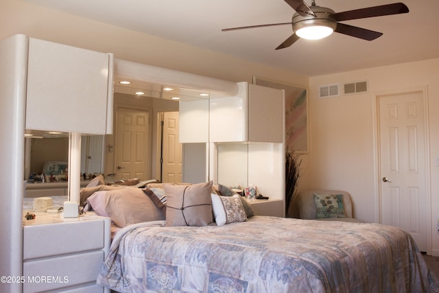 bedroom with visible vents and ceiling fan