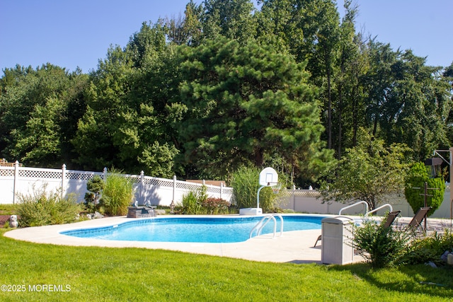 view of swimming pool with a fenced in pool, a water slide, a yard, and fence