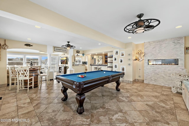 game room with recessed lighting, a large fireplace, ceiling fan, billiards, and ornate columns