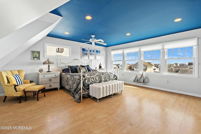 bedroom featuring recessed lighting, vaulted ceiling, light wood-style flooring, and baseboards