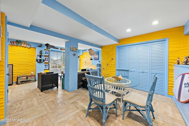 dining space with a ceiling fan and recessed lighting