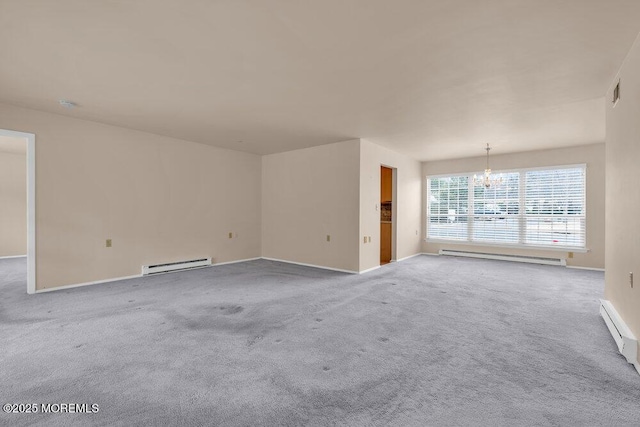 unfurnished living room with a notable chandelier, a baseboard radiator, and carpet flooring