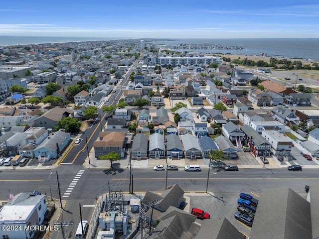 aerial view with a water view and a residential view