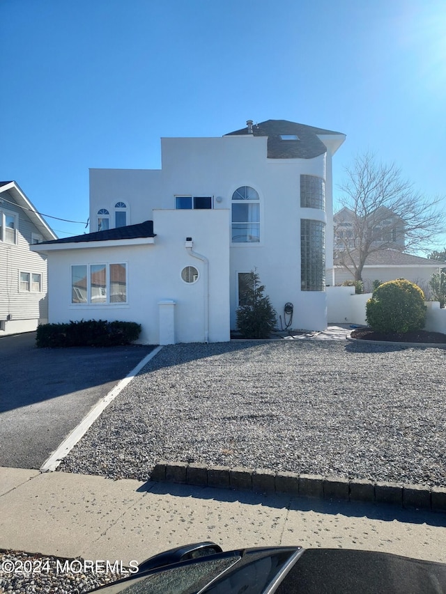 view of front of house featuring stucco siding