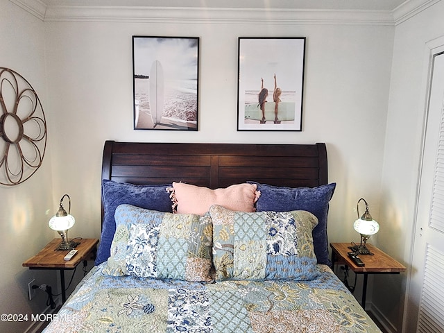 bedroom featuring crown molding