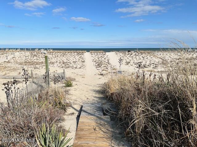 view of water feature featuring a beach view